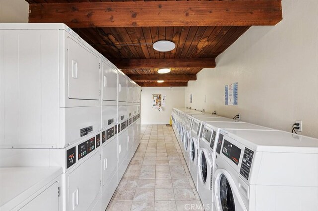 310 S Miraleste Dr Unit 69, San Pedro, CA 90732 - community laundry room featuring stacked washing machine and dryer, wood ceiling, independent washer and dryer, and light tile patterned floors