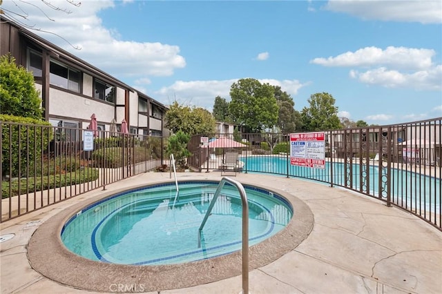 310 S Miraleste Dr Unit 69, San Pedro, CA 90732 - view of swimming pool with a hot tub