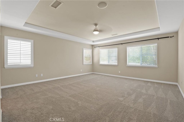 12632 Chimney Rock Dr, Rancho Cucamonga, CA 91739 - carpeted spare room with a tray ceiling and baseboards
