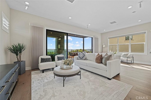 26290 Paseo Sillin, San Juan Capistrano, CA 92675 - living room featuring wood finished floors, baseboards, and recessed lighting
