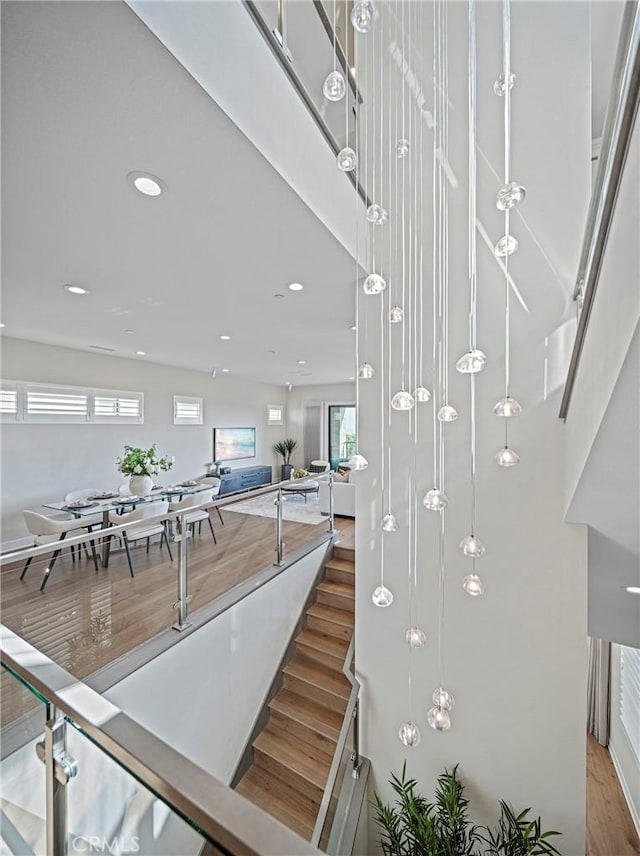 26290 Paseo Sillin, San Juan Capistrano, CA 92675 - staircase featuring wood finished floors and recessed lighting