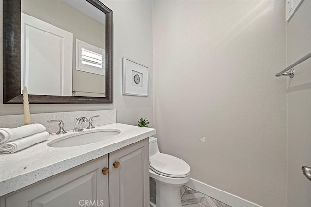 26290 Paseo Sillin, San Juan Capistrano, CA 92675 - half bathroom with toilet, vanity, and baseboards