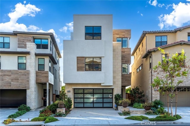 26290 Paseo Sillin, San Juan Capistrano, CA 92675 - contemporary house featuring a garage, driveway, and stucco siding
