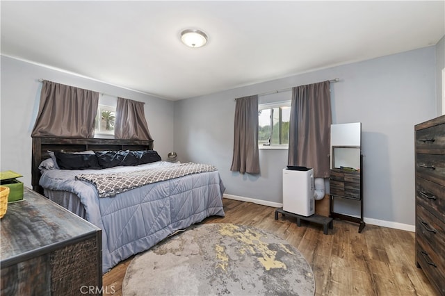 3075 Ronald, Riverside, CA 92506 - bedroom featuring wood finished floors and baseboards