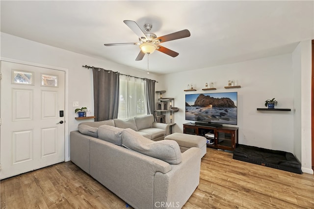 3075 Ronald, Riverside, CA 92506 - living area with a ceiling fan, wood finished floors, and baseboards
