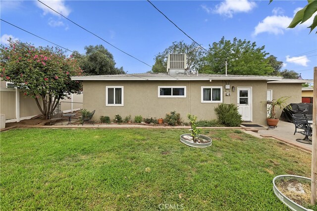 3075 Ronald, Riverside, CA 92506 - rear view of house featuring a patio, stucco siding, and central AC