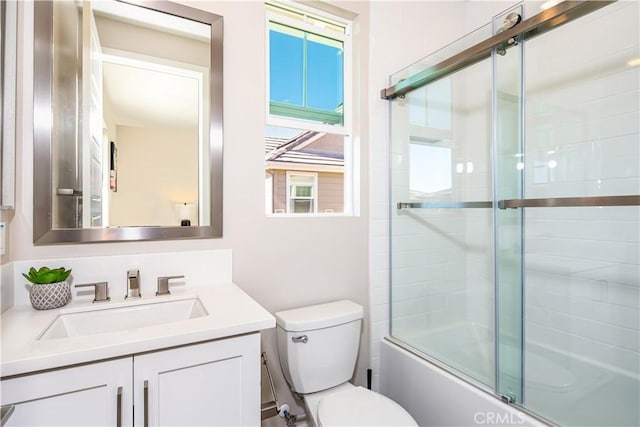 71 Einstein Way, Irvine, CA 92618 - bathroom featuring toilet, plenty of natural light, vanity, and shower / bath combination with glass door
