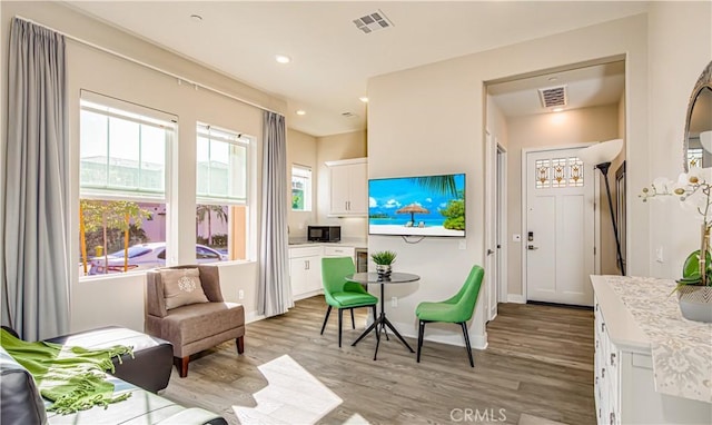 71 Einstein Way, Irvine, CA 92618 - sitting room with light wood finished floors, recessed lighting, and baseboards