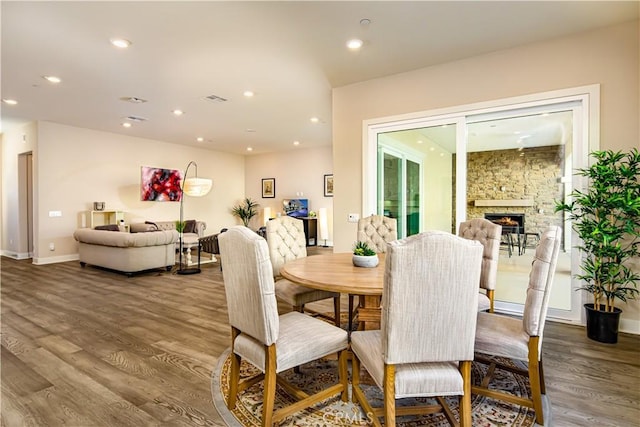 71 Einstein Way, Irvine, CA 92618 - dining area featuring wood finished floors, a fireplace, recessed lighting, and baseboards