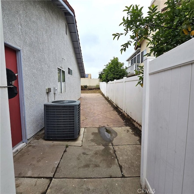 1822 Glover St, Redlands, CA 92374 - fenced backyard featuring central air condition unit and a patio area