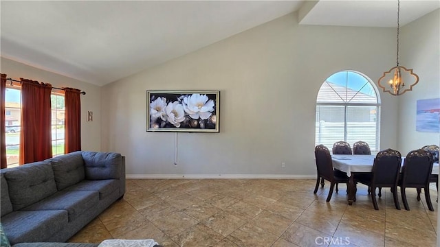 1822 Glover St, Redlands, CA 92374 - living room featuring a chandelier, baseboards, and high vaulted ceiling