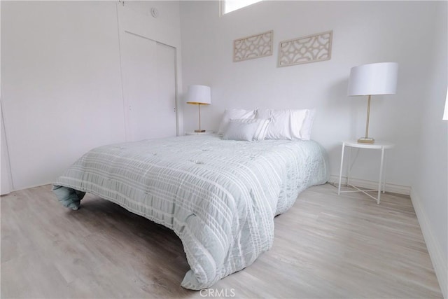 5921 Los Ramos Cir, Buena Park, CA 90620 - bedroom with wood finished floors and a closet