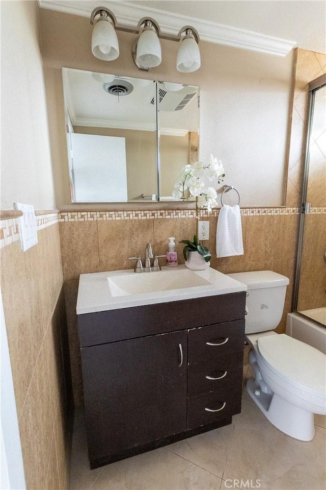 5921 Los Ramos Cir, Buena Park, CA 90620 - full bathroom with tile walls, tile patterned floors, vanity, crown molding, and shower / washtub combination