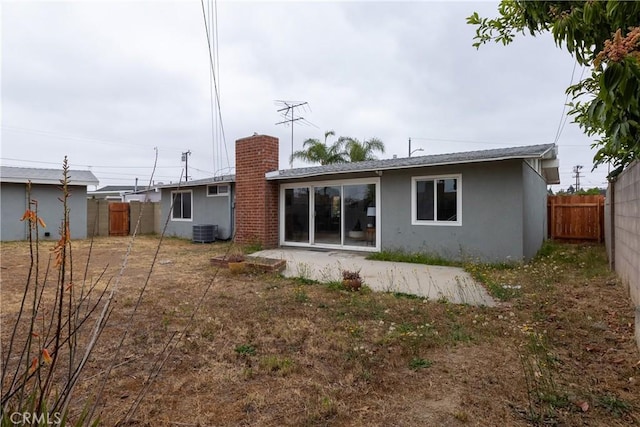 5921 Los Ramos Cir, Buena Park, CA 90620 - rear view of property with stucco siding, a fenced backyard, and a patio