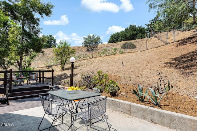 4991 Coringa Dr, Highland Park, CA 90042 - view of patio featuring a deck and outdoor dining area