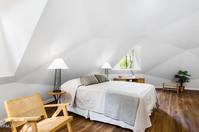4991 Coringa Dr, Highland Park, CA 90042 - bedroom featuring dark wood-style floors, vaulted ceiling, and baseboards
