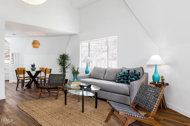 4991 Coringa Dr, Highland Park, CA 90042 - living room with a high ceiling, wood finished floors, and baseboards