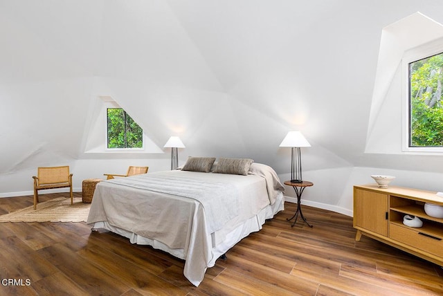 4991 Coringa Dr, Highland Park, CA 90042 - bedroom with vaulted ceiling, wood finished floors, and baseboards