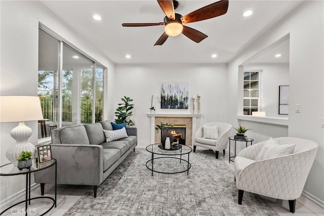 27831 Silverton Ct, Valencia, CA 91354 - living room with recessed lighting, ceiling fan, and a tiled fireplace