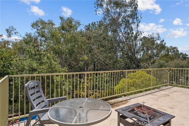 27831 Silverton Ct, Valencia, CA 91354 - view of patio / terrace with a fire pit