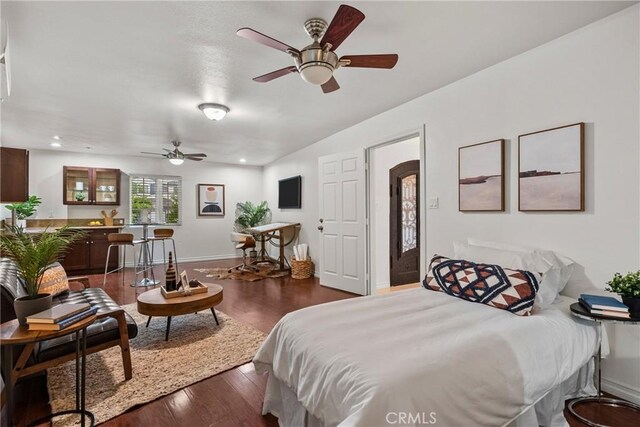 27831 Silverton Ct, Valencia, CA 91354 - bedroom featuring dark wood finished floors, recessed lighting, and arched walkways