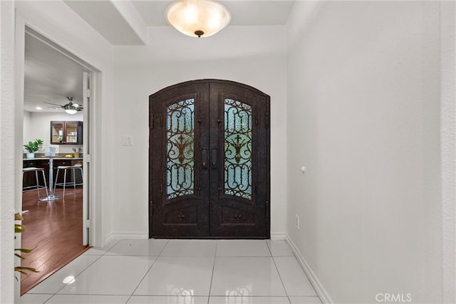 27831 Silverton Ct, Valencia, CA 91354 - tiled foyer entrance featuring arched walkways and french doors