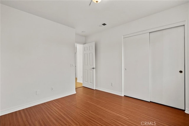 27831 Silverton Ct, Valencia, CA 91354 - unfurnished bedroom featuring wood finished floors and a closet
