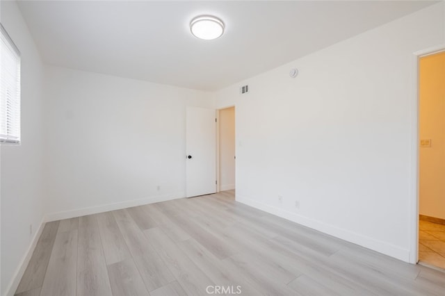 7741 Via Napoli Unit 77, Burbank, CA 91504 - spare room with light wood finished floors and baseboards