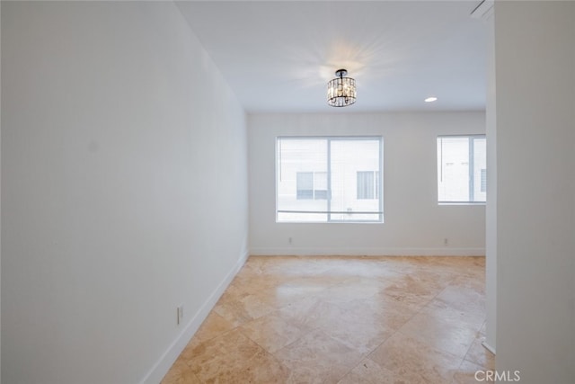 7741 Via Napoli Unit 77, Burbank, CA 91504 - empty room featuring a chandelier and recessed lighting