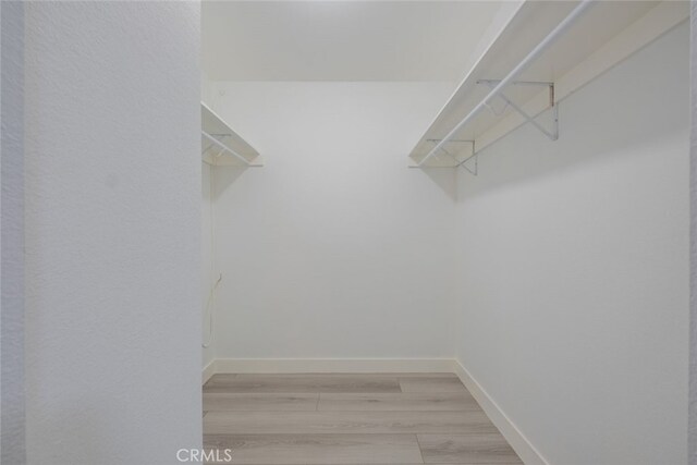 7741 Via Napoli Unit 77, Burbank, CA 91504 - spacious closet featuring light wood-type flooring