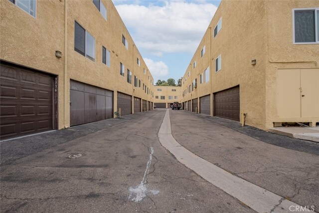 7741 Via Napoli Unit 77, Burbank, CA 91504 - view of asphalt road featuring community garages