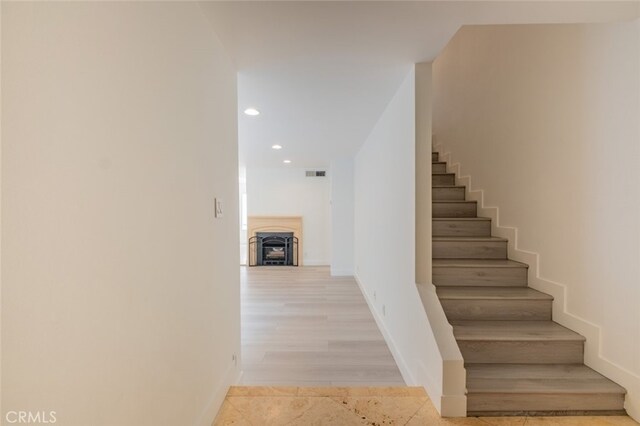 7741 Via Napoli Unit 77, Burbank, CA 91504 - stairway with recessed lighting and a fireplace