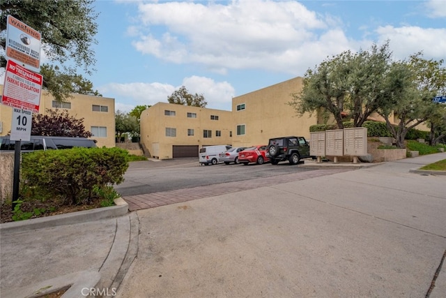 7741 Via Napoli Unit 77, Burbank, CA 91504 - uncovered parking lot with mail area