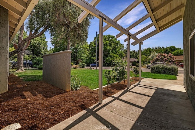 1720 N Cherry St, Chico, CA 95926 - view of patio featuring a pergola and view of wooded area