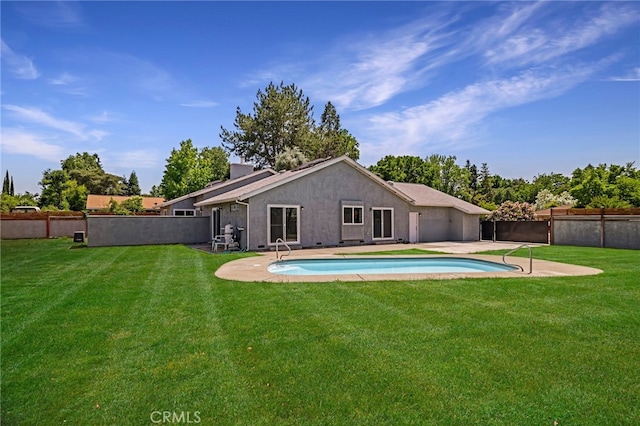 1720 N Cherry St, Chico, CA 95926 - back of house with a fenced backyard, stucco siding, and a patio area