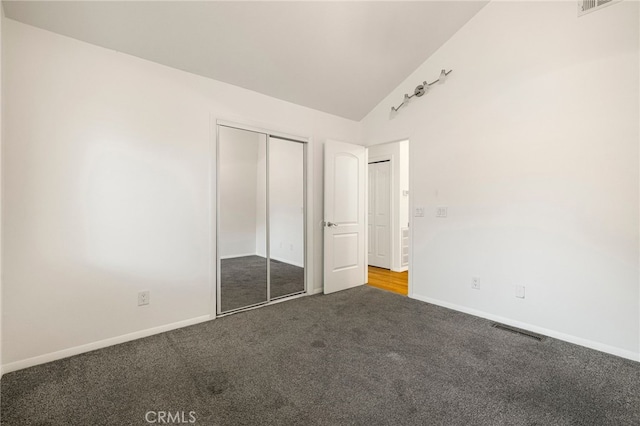 1720 N Cherry St, Chico, CA 95926 - unfurnished bedroom featuring carpet floors, lofted ceiling, and a closet