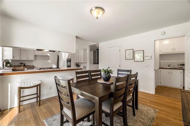 1720 N Cherry St, Chico, CA 95926 - dining area with light wood finished floors