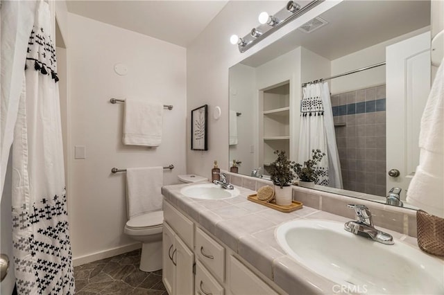 1720 N Cherry St, Chico, CA 95926 - bathroom with double vanity, a shower with curtain, and tile patterned floors