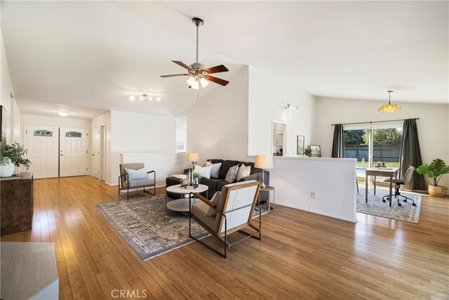 1720 N Cherry St, Chico, CA 95926 - living area featuring vaulted ceiling, hardwood / wood-style flooring, and ceiling fan