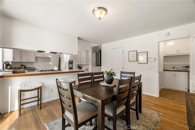 1720 N Cherry St, Chico, CA 95926 - dining area featuring light wood-style floors