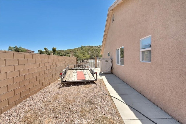 8250 Snow Cap Ave, Pinon Hills, CA 92372 - fenced backyard featuring a gate