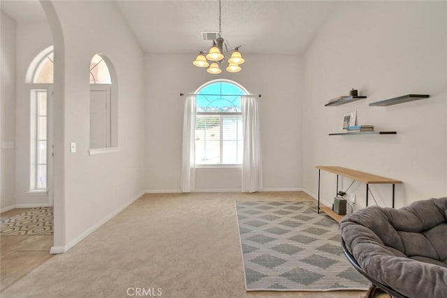 8250 Snow Cap Ave, Pinon Hills, CA 92372 - entryway with a chandelier, carpet floors, baseboards, and arched walkways