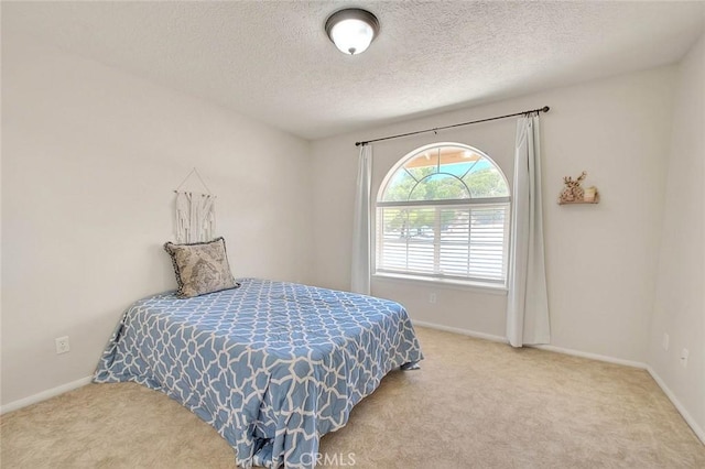 8250 Snow Cap Ave, Pinon Hills, CA 92372 - bedroom featuring carpet flooring, baseboards, and a textured ceiling