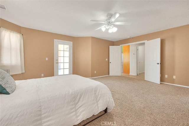 8250 Snow Cap Ave, Pinon Hills, CA 92372 - bedroom with baseboards, carpet floors, and a ceiling fan