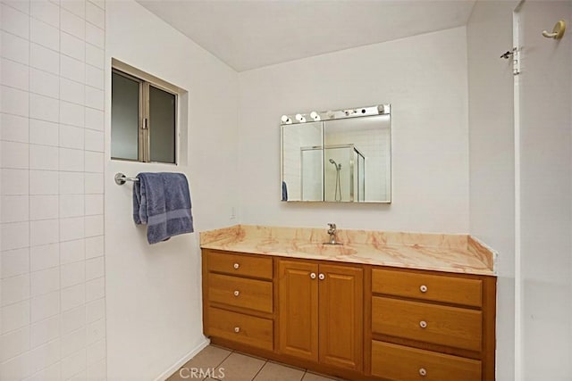 27262 Via Callejon Unit B, San Juan Capistrano, CA 92675 - bathroom featuring an enclosed shower, vanity, and tile patterned flooring