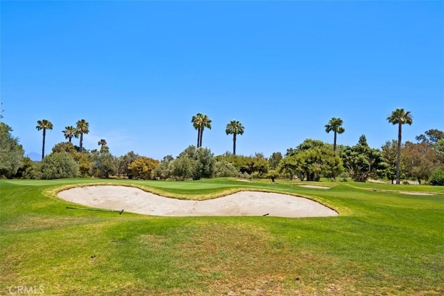 27262 Via Callejon Unit B, San Juan Capistrano, CA 92675 - view of home's community with golf course view, a lawn, and view of scattered trees