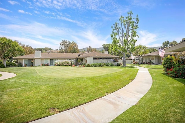 27262 Via Callejon Unit B, San Juan Capistrano, CA 92675 - view of grassy yard featuring a putting area