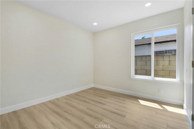 1024 E Dore St, West Covina, CA 91792 - unfurnished room featuring light wood-style flooring, baseboards, and recessed lighting