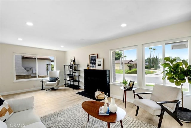 1024 E Dore St, West Covina, CA 91792 - living area featuring light wood finished floors, baseboards, and recessed lighting