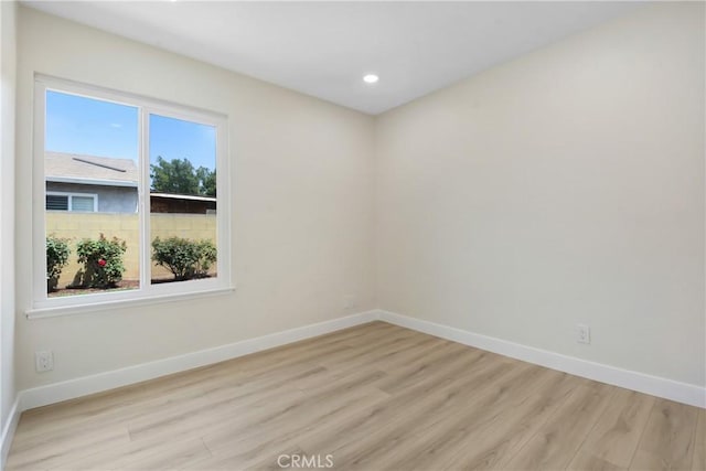 1024 E Dore St, West Covina, CA 91792 - unfurnished room featuring light wood-type flooring, baseboards, and recessed lighting